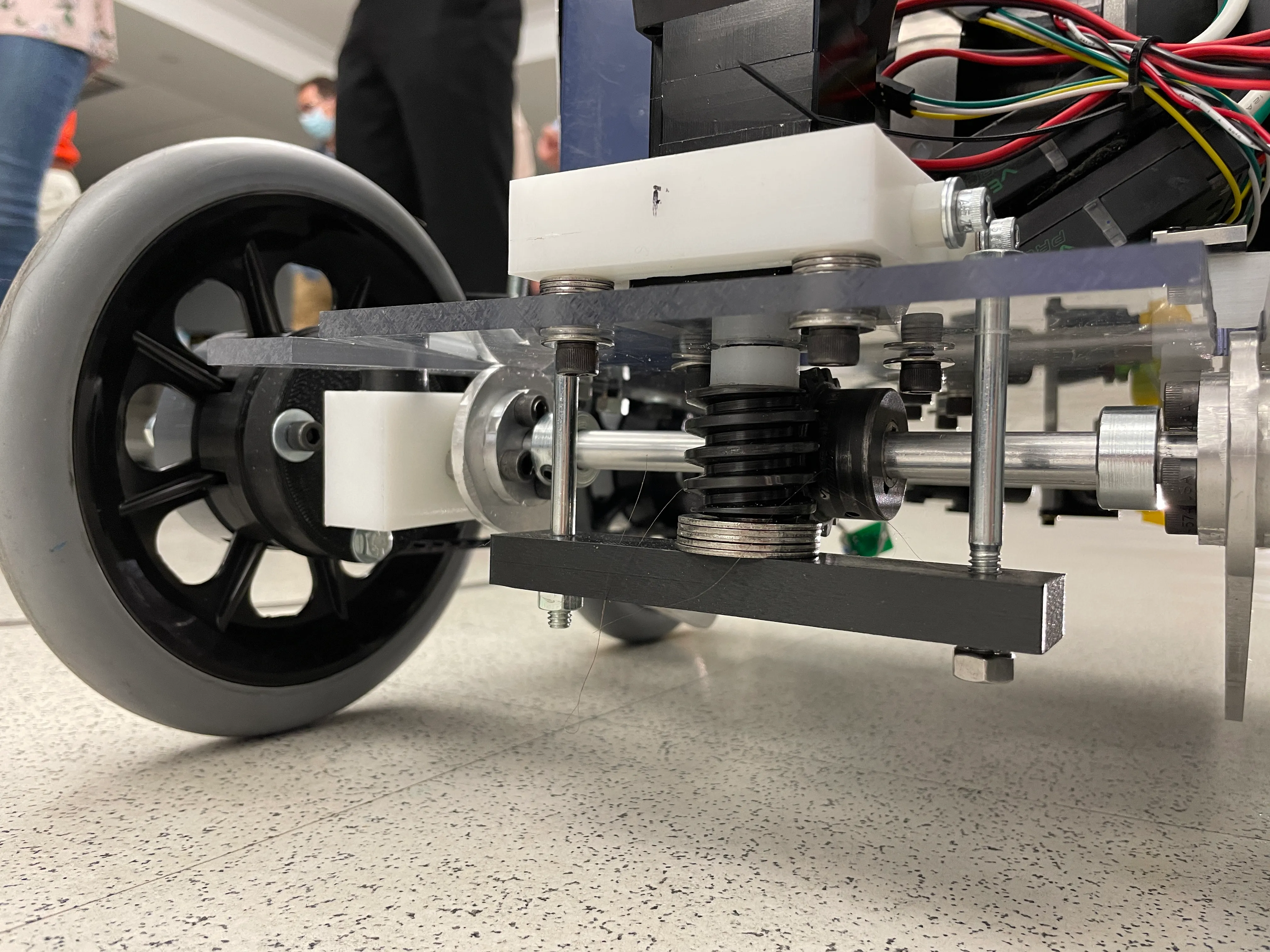 Lift mechanism with arms folded underneath the robot
