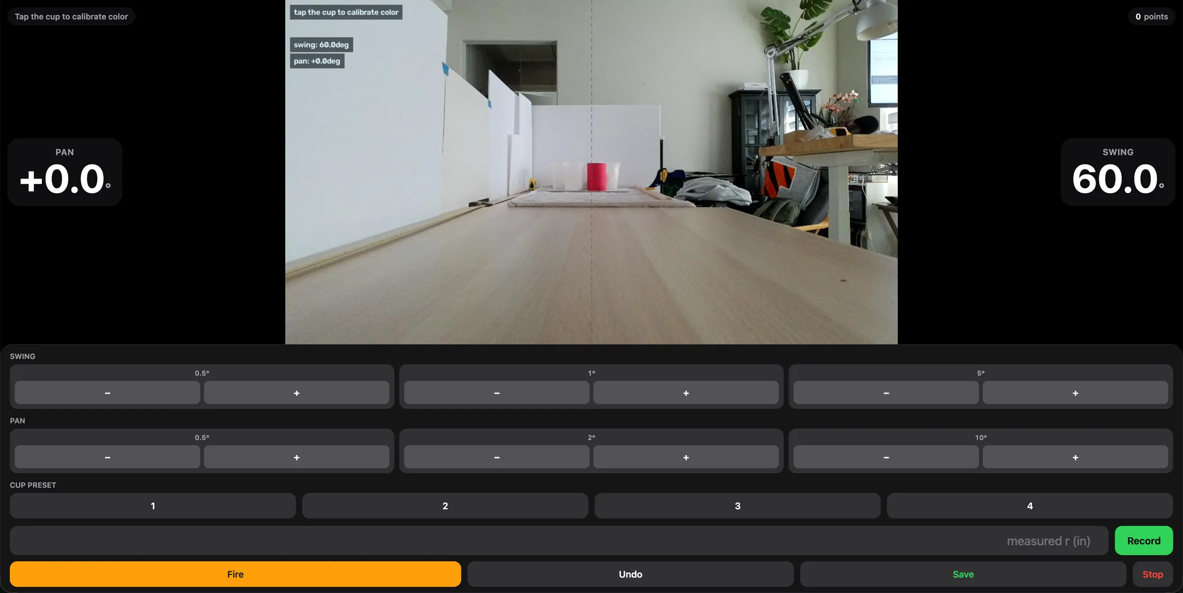 The web app in range-calibration mode: live camera feed, pan and swing readouts, jog steps, and the four cup presets